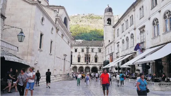  ?? PHOTOS: JOANNE BLAIN ?? With a population of 28,000, Dubrovnik is an old town that features cobbled streets and centuries-old buildings, including a 14th-century Franciscan monastery.