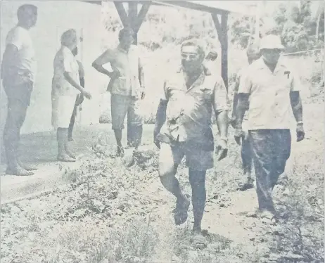  ?? Picture: FT FILE ?? The then Minister for Agricultur­e Jonati Mavoa, right, doing the rounds of the resort complex on Naigani Island. In the foreground is Mr John Williams and in the background are other officials with Mrs Williams.
