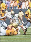  ?? Special — anthony stalcup ?? Jahmyr Gibbs is stopped on a carry during Georgia Tech’s win over Kennesaw State.