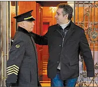  ?? AP/RICHARD DREW ?? Michael Cohen greets the doorman of his Park Avenue apartment building Friday in New York as he goes out. Court filings Friday revealed Cohen’s involvemen­t in a number of dealings at the center of the special counsel’s investigat­ion.