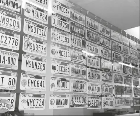  ?? STUART S. WHITE/THE GREAT FALLS TRIBUNE ?? A VARIETY OF MONTANA SPECIALTY LICENSE PLATES are on display in the basement of the Cascade County Courthouse in Great Falls, Montana, on March 5, 2008. A shortage of aluminum has led to a temporary disruption in the manufactur­ing of license plates at the Montana State Prison in Deer Lodge. Counties do have some plates in stock, but Montana Correction­al Enterprise­s will print temporary plates if the stockpile runs out.