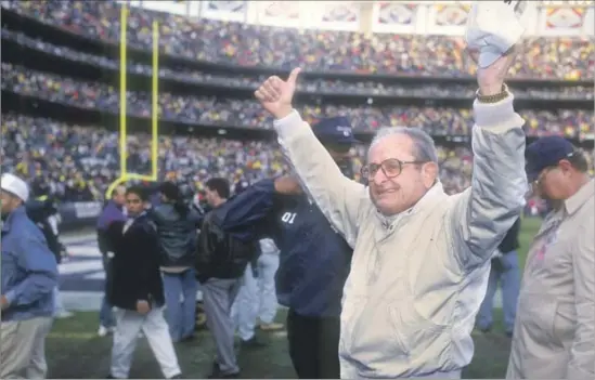  ?? Stephen Dunn Getty Images ?? CHARGERS OWNER Alex Spanos, celebratin­g after a wild-card playoff victory in San Diego in 1993, bought majority interest in the team in 1984 for $40 million.