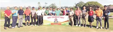  ?? ?? Participan­ts of charity golf meet gather for a group photo.