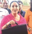  ?? Rohit Jain Paras ?? State Finance Minister Diya Kumari arrives at the Assembly to present the Budget.