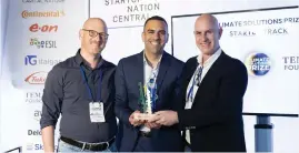  ?? (Eliran Aviral) ?? AWARDS HANDED to the winners: Danny Weber, Electriq VP Business Developmen­t; Eliran Elimelech, VP Ecosystem Developmen­t Startup Nation Central, and Baruch Halpert, Electriq CEO and executive chair.