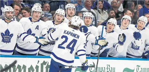  ?? CHRIS O’MEARA THE ASSOCIATED PRESS ?? Maple Leafs right-winger Kasperi Kapanen celebrates with the Toronto bench after his goal against the Tampa Bay Lightning on Thursday night.