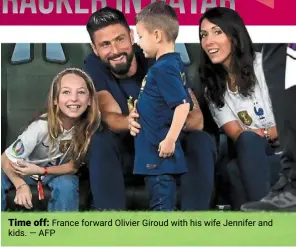  ?? ?? Time off: France forward Olivier Giroud with his wife Jennifer and kids. — AFP