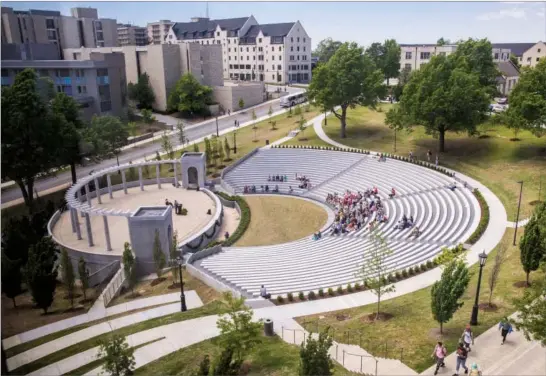  ??  ?? The Chi Omega Greek Theatre is a popular place on the University of Arkansas campus for concerts, pep rallies or simply enjoying the sun between classes.