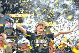  ?? ABBIE PARR/ASSOCIATED PRESS FILE PHOTO ?? Iowa guard Caitlin Clark celebrates March 10 after an overtime win against Nebraska in the final of the Big Ten Tournament in Minneapoli­s.