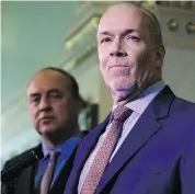  ?? — CP FILES ?? The Greens’ Andrew Weaver and NDP’s John Horgan are expected to lead their parties in defeating the government in a confidence motion this month.