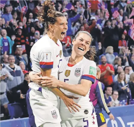  ??  ?? Tobin Heath, left, celebrates with Kelley O'Hara after scoring against Sweden on Thursday. MICHAEL CHOW/USA TODAY SPORTS