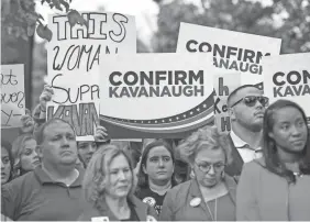  ??  ?? Supporters of Supreme Court nominee Brett Kavanaugh gather outside the Dirksen Senate Office Building before Ford’s testimony.