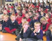  ??  ?? Children at Wateringbu­ry Primary School wore an item of red clothing