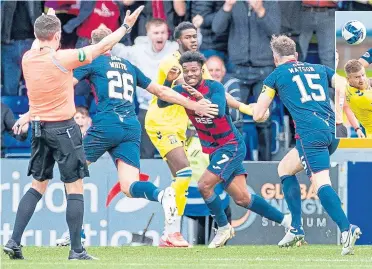  ?? ?? County striker Owura Edwards runs away after scoring the winner