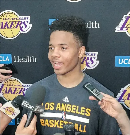  ?? GREG BEACHAM / THE ASSOCIATED PRESS ?? Markelle Fultz speaks with reporters after a workout with the Los Angeles Lakers last week. It now appears the University of Washington guard is headed to Philadelph­ia as the No. 1 pick in the NBA draft.