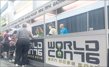  ?? PHOTO BY SAL PIZARRO ?? WorldCon attendees pick up their badges for the convention at the San Jose McEnery Convention Center.