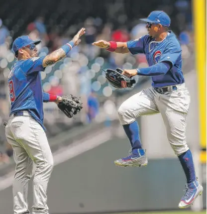 ?? | AP ?? Second baseman Javy Baez ( left) and outfielder Jon Jay are in a celebrator­y mood after the Cubs’ sixth consecutiv­e victory.