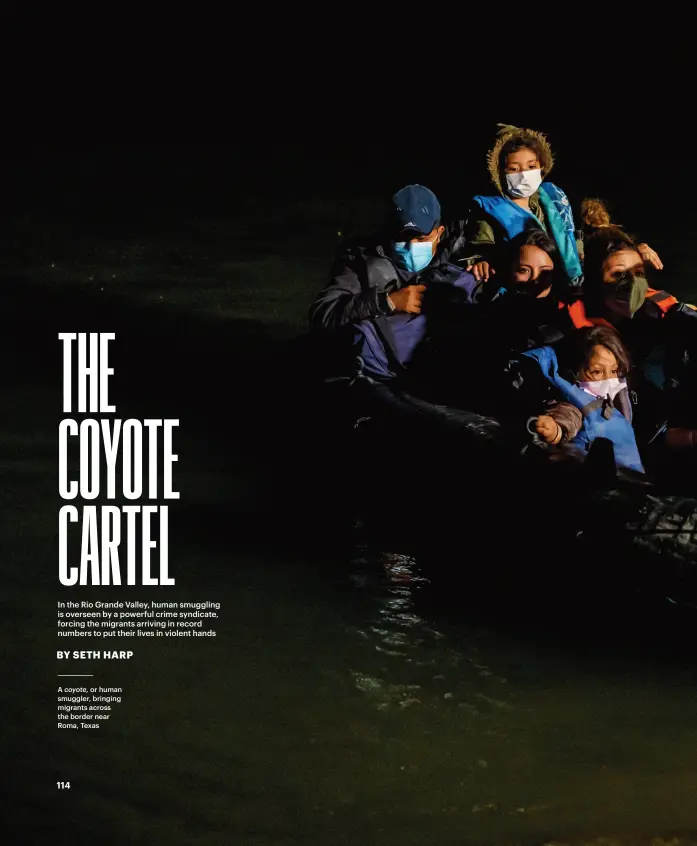  ??  ?? A coyote, or human smuggler, bringing migrants across the border near Roma, Texas