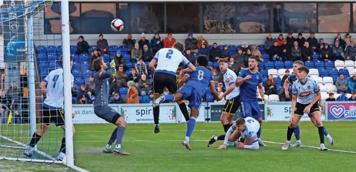  ?? Phil Jones/sportseyep­hoto.com ?? ●●Kane Drummond heads the Silkmen into a 2-1 lead during Saturday’s 5-1 victory against Guiseley at the Leasing.com Stadium