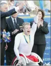 ?? Jim Rogash, Afp-getty Images ?? Joshua Cassidy reacts after being crowned winner of the men’s wheelchair division at the 116th Boston Marathon on Monday.