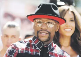  ?? Picture: Reuters ?? DRESSED FOR SUCCESS. Floyd Mayweather arrives at Toshiba Plaza in Las Vegas for a public ceremony on Tuesday ahead his fight against Conor McGregor.