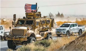  ?? PHOTO AFP ?? Hier matin, les forces américaine­s ont quitté des positions-clés à Ras al-aïn.