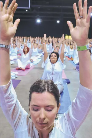  ??  ?? CENTRED: India's Prime Minister Narendra Modi (below) leads a Yoga for Peace event in Buenos Aires, on the sidelines of the G20 meeting in the Argentine capital. Picture: AP PHOTO