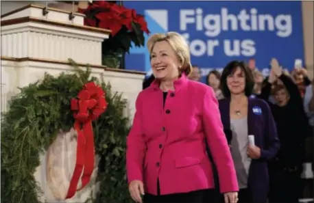  ?? STEVEN SENNE — THE ASSOCIATED PRESS ?? Democratic presidenti­al candidate South Church in Portsmouth, N.H.
Hillary
Clinton
smiles as she
arrives at a town hall style campaign event, Tuesday
at