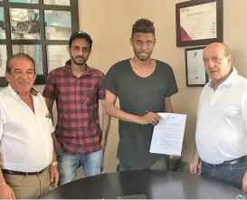  ??  ?? Oman national team midfielder Raed Ibrahim (second from right), his agent Issam al Shanfari (second from left), and Valletta FC officials after the signing of a two-year deal between Raed and Valletta in Malta