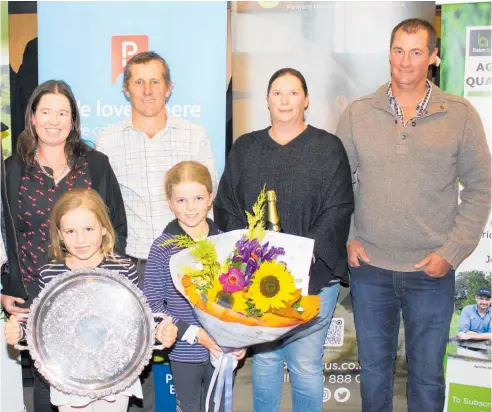 ?? ?? The FouhySimps­on Farming team were winners of Tararua Farmer of the Year. Pictured are Rachael and Brent Fouhy with their children Amelia and Charlotte and Erika Goldsworth­y with Ben Simpson.
