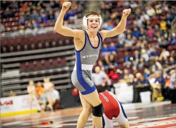  ?? PHOTOS BY NATE HECKENBERG­ER — FOR DIGITAL FIRST MEDIA ?? Above, Downingtow­n West’s Doug Zapf celebrates moments after defeating Shaler’s Ryan Sullivan, 5-2, to win the 106-pound state championsh­ip Saturday night at the Giant Center in Hershey. Below, Zapf hugs coach Brad Breese after winning the title.