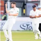 ??  ?? Lancashire’s Richard Gleeson takes the wicket of Harry Swindells