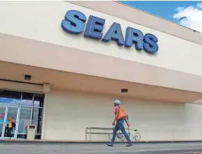  ?? AP ?? Sales at Sears stores open at least a year fell 17 percent, the company says in its quarterly report.
