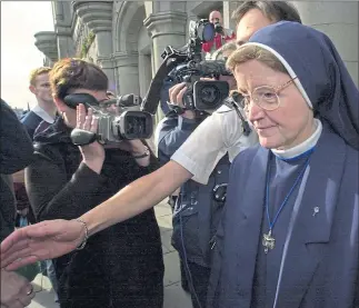  ??  ?? Sister Alphonso leaves Aberdeen Sheriff Court after her conviction in 2000
