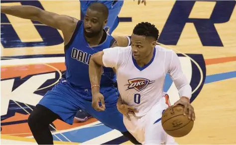  ?? J Pat Carter photos / Getty Images ?? Oklahoma City handled Dallas in five games, with guard Russell Westbrook, right, averaging 26 points a game.