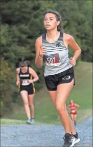  ?? Scott Herpst ?? Ridgeland’s Paige Blanchard crests the top of a grueling hill near the end of the course during a cross country meet this past Thursday at Edwards Park in Dalton.