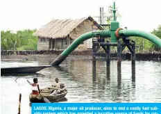  ??  ?? LAGOS: Nigeria, a major oil producer, aims to end a costly fuel subsidy system which has provided a lucrative source of funds for corrupt officials and businessme­n.—AFP