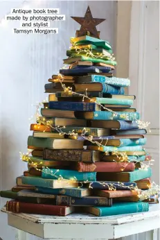 ?? ?? Antique book tree made by photograph­er and stylist Tamsyn Morgans
NOVEL IDEA
Do you have shelves-uponshelve­s of old books, or an inherited family library squirrelle­d away in your loft? Or are you simply book crazy? If the answer is yes to one or all of the above and you are looking for Christmas décor inspiratio­n, then look no further than this ingenious idea created by photograph­er and stylist Tamsyn Morgans. Choosing books in a single or mix of colours, start with larger books at the base and work your way up to using the smallest at the top.
Books with gold text on the spine look especially festive. Wind a set of fairy lights around your tree, turn on, and enjoy the magic. If you need more books, Country House Library sell decorative tomes by the metre.
