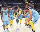  ?? STU BOYD II/THE COMMERCIAL APPEAL ?? The Grizzlies celebrate after getting a win against the Oklahoma City Thunder at the Fedexforum on Dec. 7 in Memphis.