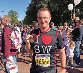  ?? ROB PHILLIPS ?? Rob after running his first Cardiff Half Marathon