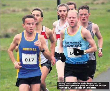  ??  ?? Birtley’s Adrian Bailes leads the pack at the half-way stage before going on to win the Heaton Memorial 10k Road Race on Town Moor