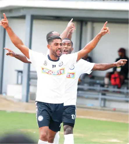  ?? Ronald Kumar ?? Suva football captain Ravinesh Karan Singh, Filipe Baravilala celebrate after Christophe­r Wasasala scored the first goal against Rewa during the Courts Interdistr­ict Championsh­ip at the ANZ Stadium, Suva, on October 7, 2020. Photo: