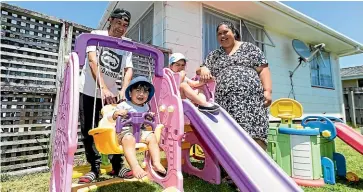  ?? SIMON O’CONNOR/ STUFF ?? Te Rina Waiwiri is pregnant with her third child and will return to work after three months maternity leave. After that her partner, Darren Roebuck, will look after the baby and the couple’s two other children, Niko, 1, and Jordyn, 3.