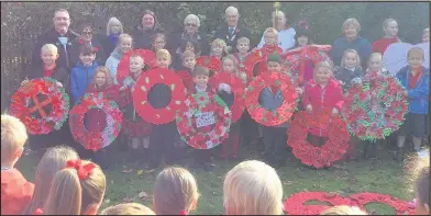  ??  ?? Burbage Infants School and Burbage Junior School held a Remembranc­e Service in Pughe’s Paddock in Burbage