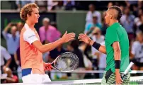  ?? AFP file ?? Alexander Zverev (left) and Nick Kyrgios shake hands after a match at the Miami Open. —