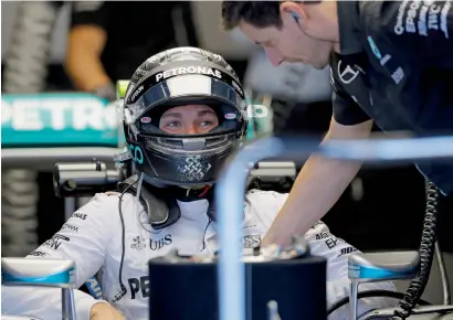  ?? AP ?? Mercedes driver Nico Rosber gets set for the first practice session for the US Grand Prix at the Circuit of the Americas in Austin, Texas. —