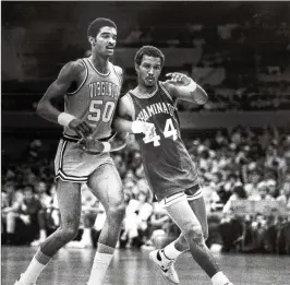  ?? ASSOCIATED PRESS 1982 ?? Chaminade’s Tony Randolph (right) jostles with Ralph Sampson during the tiny school’s 77-72 victory over then-No. 1 Virginia on Dec. 23, 1982. The upset led to the creation of the Maui Invitation­al. Chaminade will not be in this year’s Maui field.