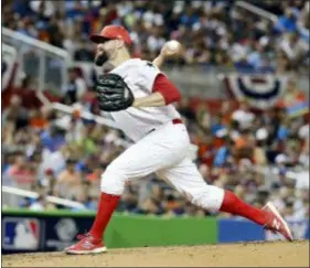  ?? THE ASSOCIATED PRESS FILE ?? Pat Neshek delivers a sideways pitch in the All-Star Game last July 11. Neshek was the only Phillies representa­tive for the Midseason Classic in 2017, and was subsequent­ly traded to Colorado before re-signing with the Phillies last December.