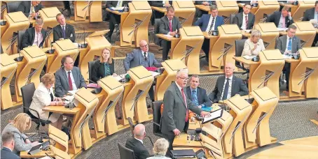  ?? Picture: PA. ?? Scottish Brexit Minister Michael Russell takes the floor at the Scottish Parliament in Edinburgh.