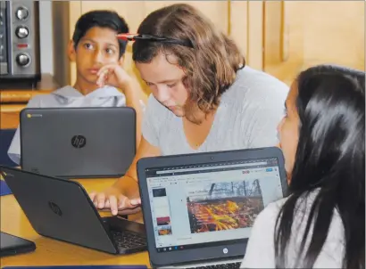  ?? Courtesy photo ?? Arboga Elementary School students work on the Lexus ECO Challenge project.